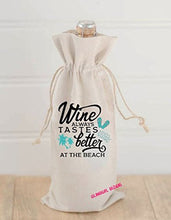 Load image into Gallery viewer, Wine Tastes Better at the Beach Canvas Wine Bag with matching Drawstring
